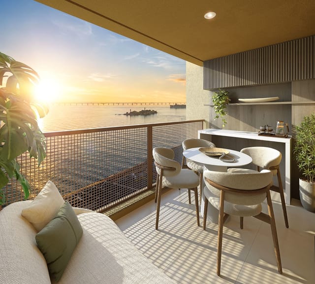 Varanda do apartamento ao pôr do sol do Erê Residencial, no Santo Cristo