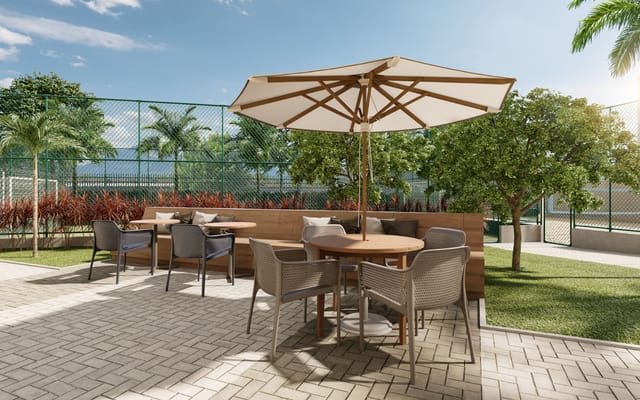 Terraço gourmet sob os guarda-sóis do Heitor dos Prazeres — Colombina, no Porto Maravilha