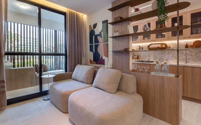 Living abierto al balcón del Metropolitan Dream, en Barra Olímpica